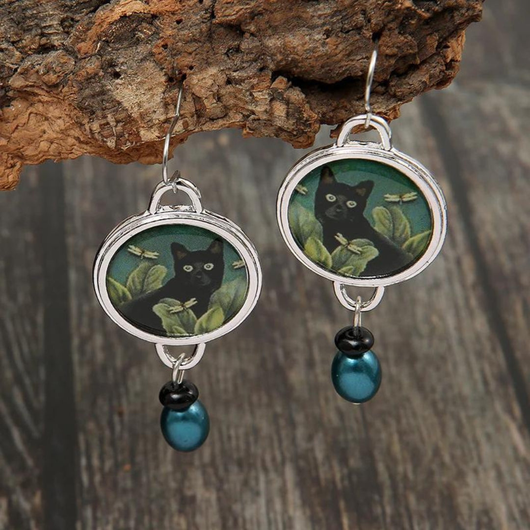 Elegantes pendientes de gato de acrílico plateado