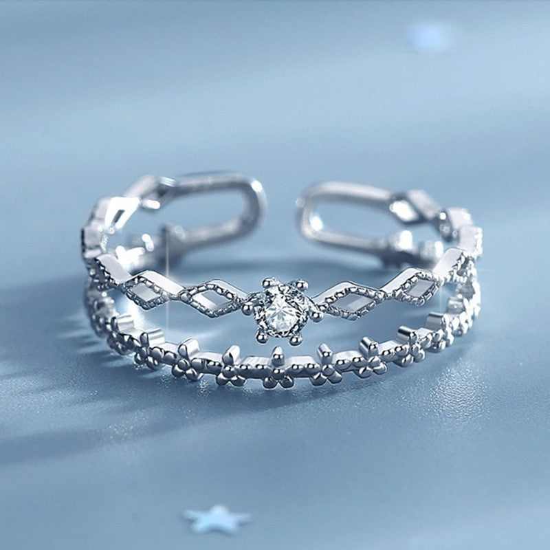Anillo de plata ajustable elegante con piedras de circonita brillantes