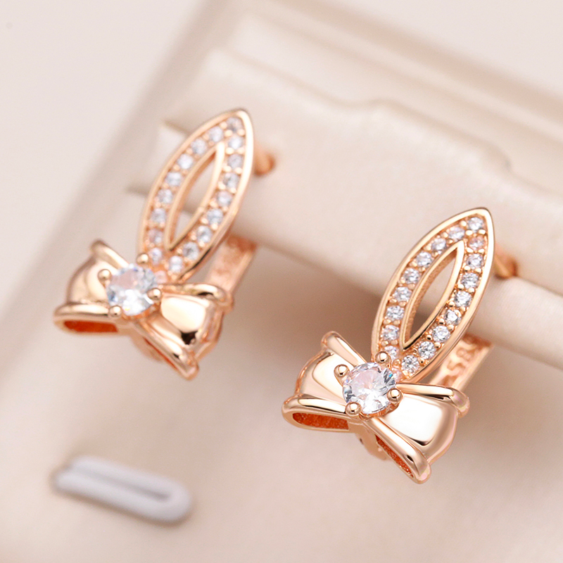 Pendientes elegantes en forma de lazo dorado para un toque de glamour