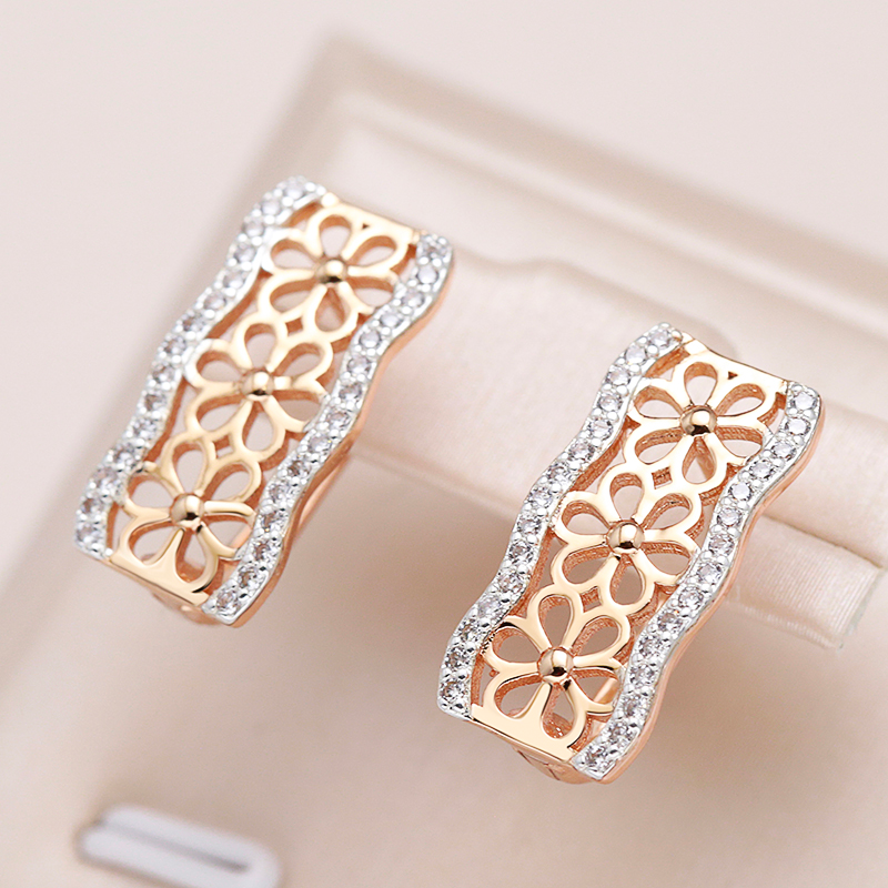 Pendientes elegantes y encantadores con motivo de margarita