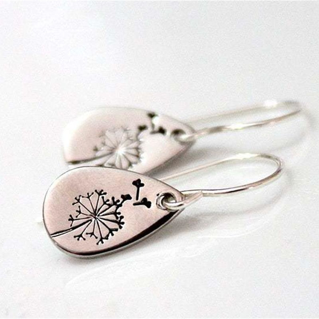 Elegante aretes de diente de león vintage de alta calidad en plata