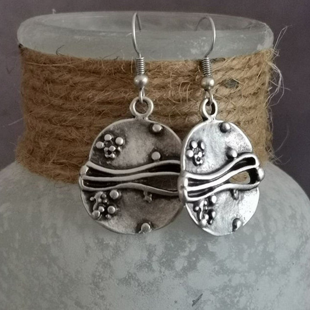 Pendientes de plata hechos a mano en estilo étnico