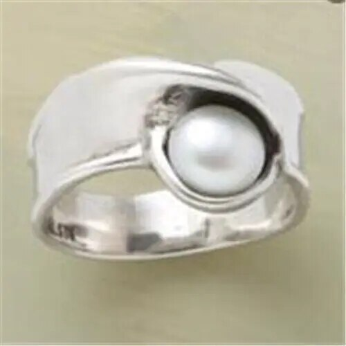 Anillo de perlas vintage clásico para una elegancia atemporal