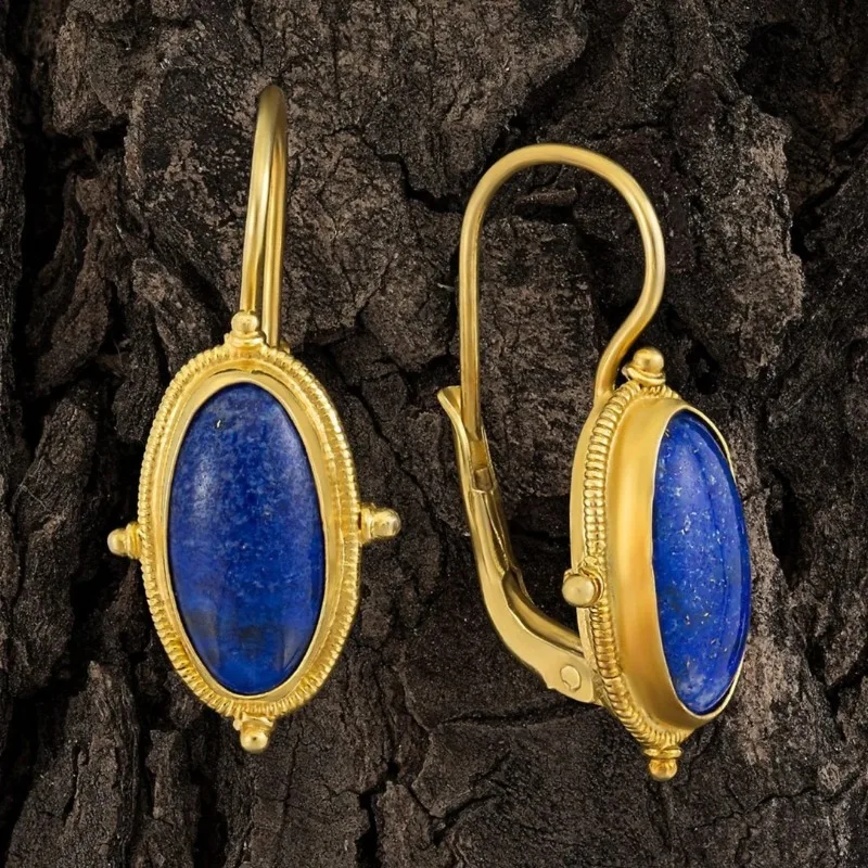 Pendientes de oro vintage suaves con acento azul