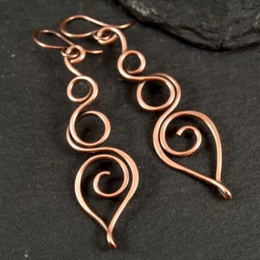 Pendientes colgantes huecos vintage elegantes de bronce