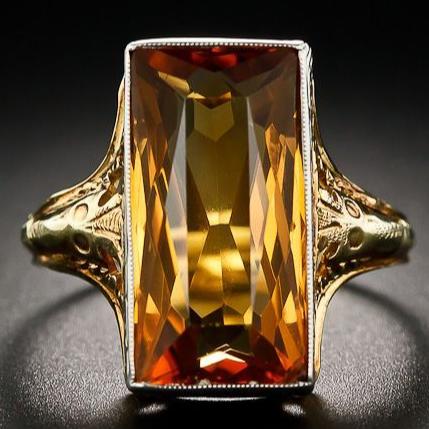 Anillo fascinante de vidrio naranja radiante