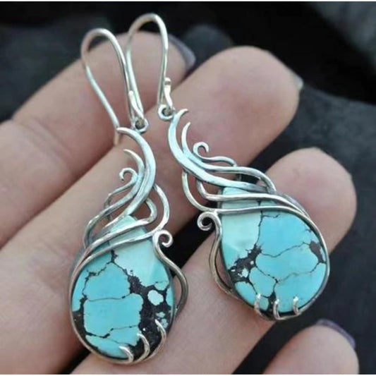 Pendientes boho elegantes con opalina brillante en plata