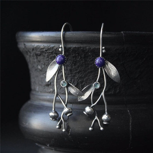 Elegantes pendientes de plata esterlina con delicados motivos de hojas