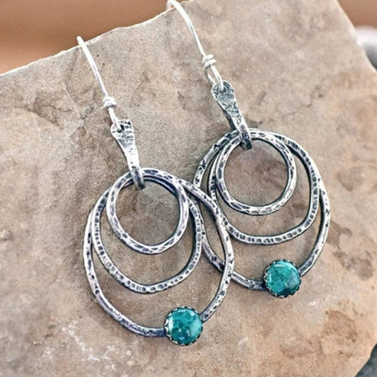 Pendientes Vintage Elegantes con Ópalo y Plata en Diseño Espiral