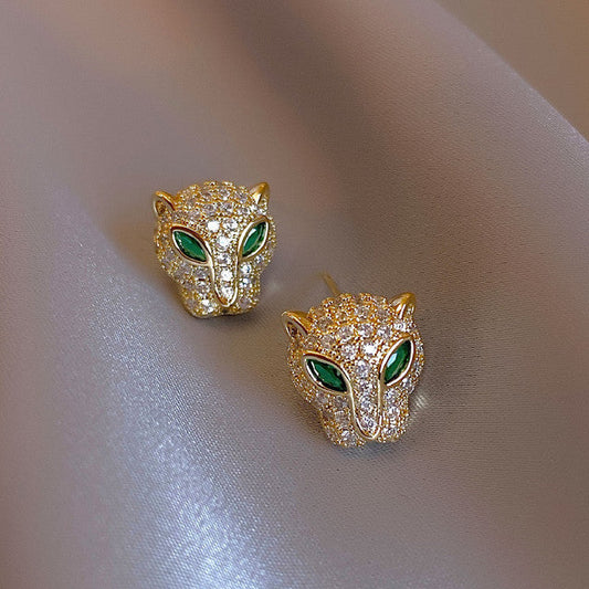 Pendientes dorados brillantes con diseño de leopardo
