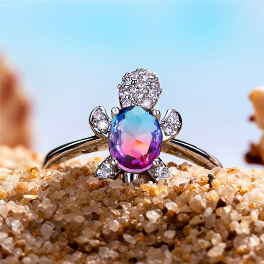 Anillo elegante de tortuga marina de la más fina plata esterlina con brillante circonita ovalada