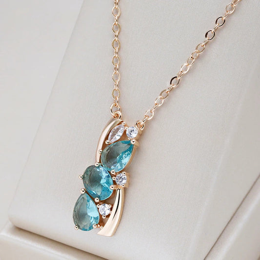 Collar de oro elegante con brillante cristal azul