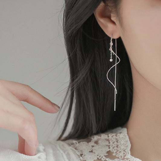 Elegantes pendientes en espiral para un look especial