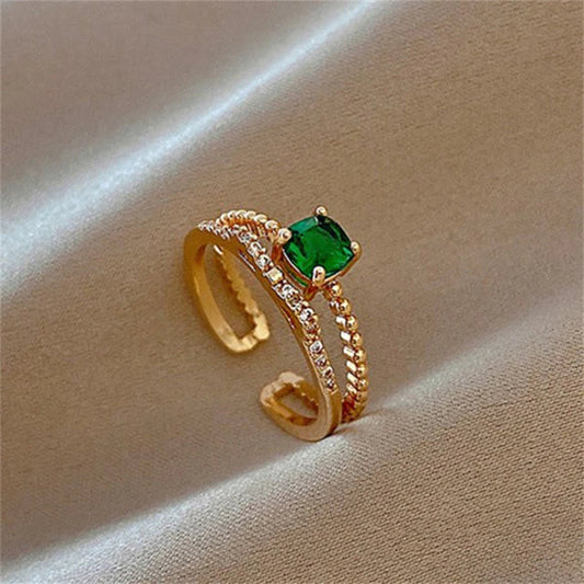 Anillo de oro ajustable elegante con brillante zirconia verde