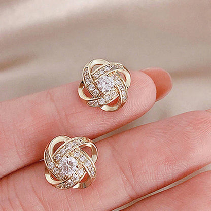 Pendientes cruzados de espiral de flores encantadoras