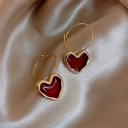 Pendientes de corazón elegantes de oro fino