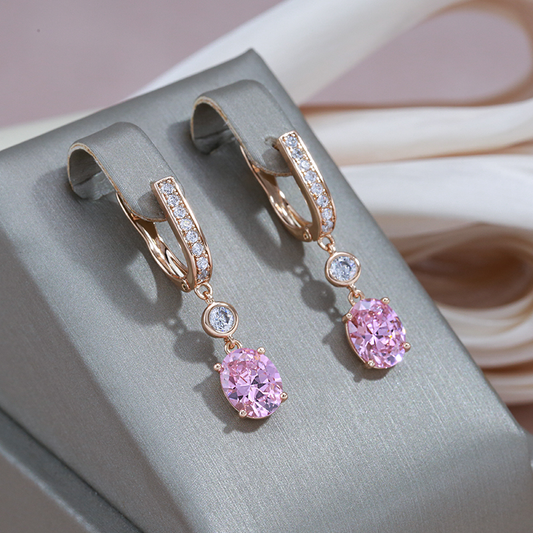 Pendientes de oro elegantes con colgante de cristal rosa brillante