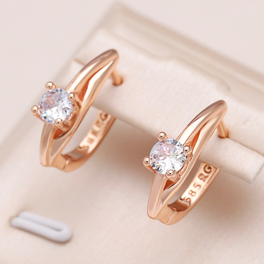 Elegantes aretes de cristal dorado para un glamour radiante