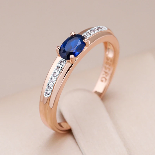 Anillo de oro con brillante cristal azul