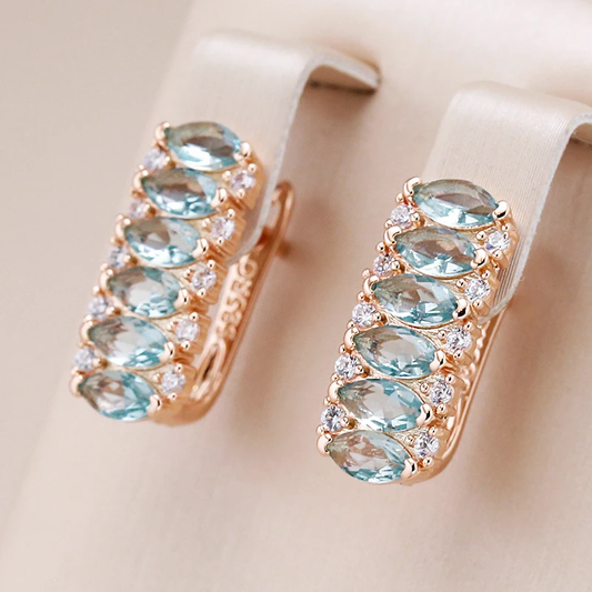 Elegantes pendientes de oro con cristales de turquesa