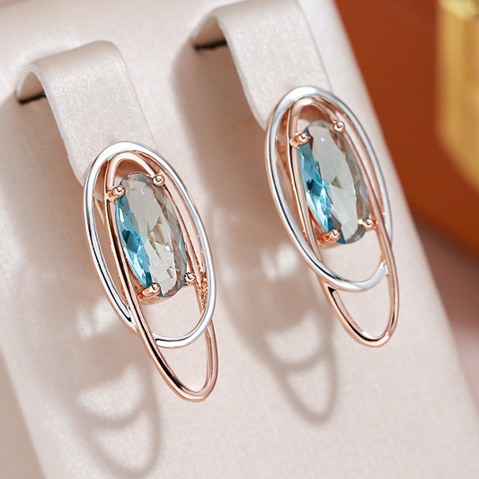 Pendientes lujosos con brillantes cristales turquesa en elegante oro y plata