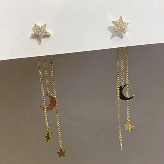 Pendientes glamurosos con brillantes estrellas doradas