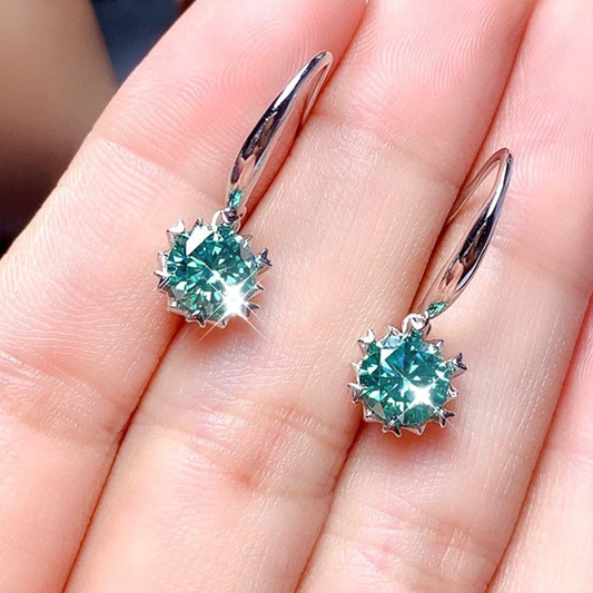 Pendientes radiantes de turquesa y diseño brillante de circonita