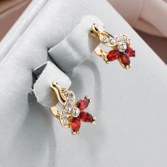 Pendientes de margaritas rojas elegantes de cristal brillante