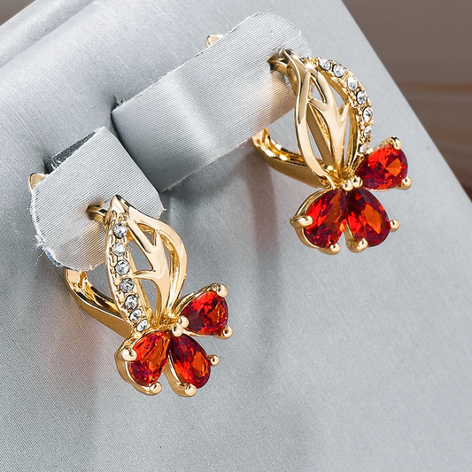 Pendientes de cristal rojo lujosos con diseño floral en flor