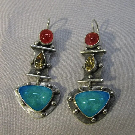 Pendientes turquesa clásicos con diseño elegante en plata
