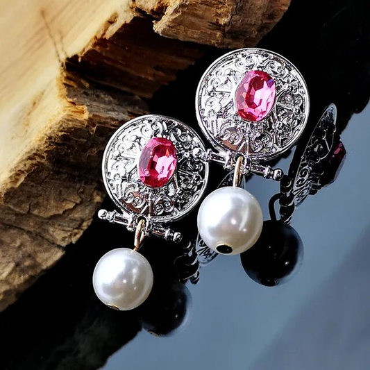 Pendientes vintage elegantes con brillantes perlas de zirconia rosa