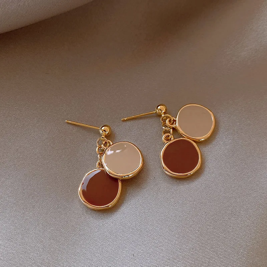 Pendientes encantadores de oro rojo y blanco de alta calidad