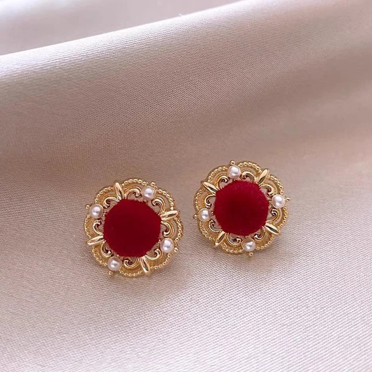 Elegantes aretes redondos de oro rosa para un toque de lujo
