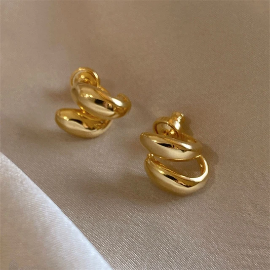 Pendientes espirales dorados elegantes para un toque de elegancia