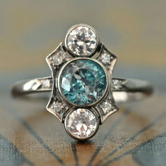 Anillo de plata vintage con brillantes cristales azules y blancos