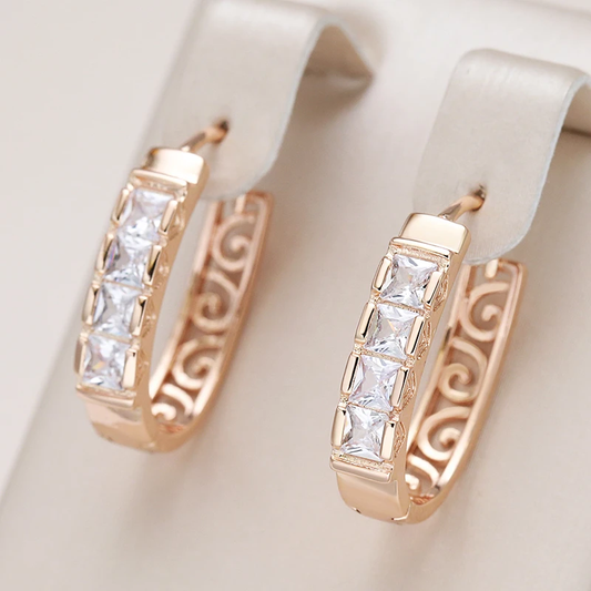 Pendientes elegantes con brillantes cristales dorados